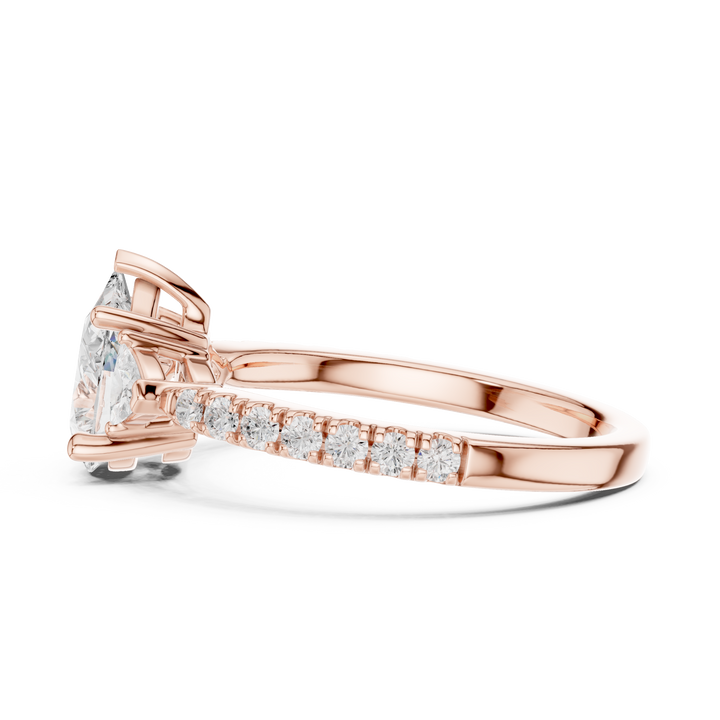 Pear Cut Three-Stone Engagement Ring with Pavé Band