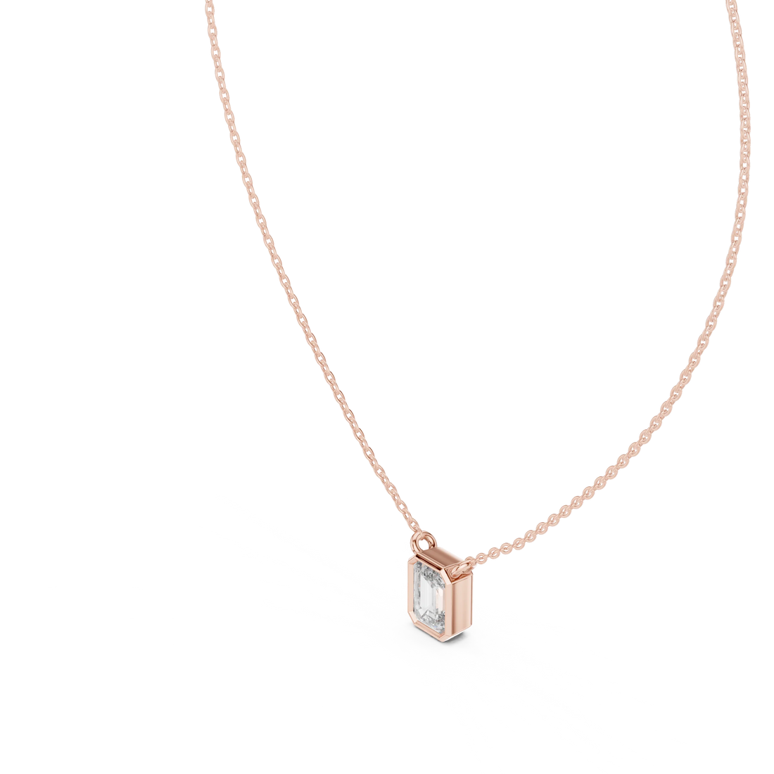 Refined Emerald Bezel Solitaire Diamond Pendant