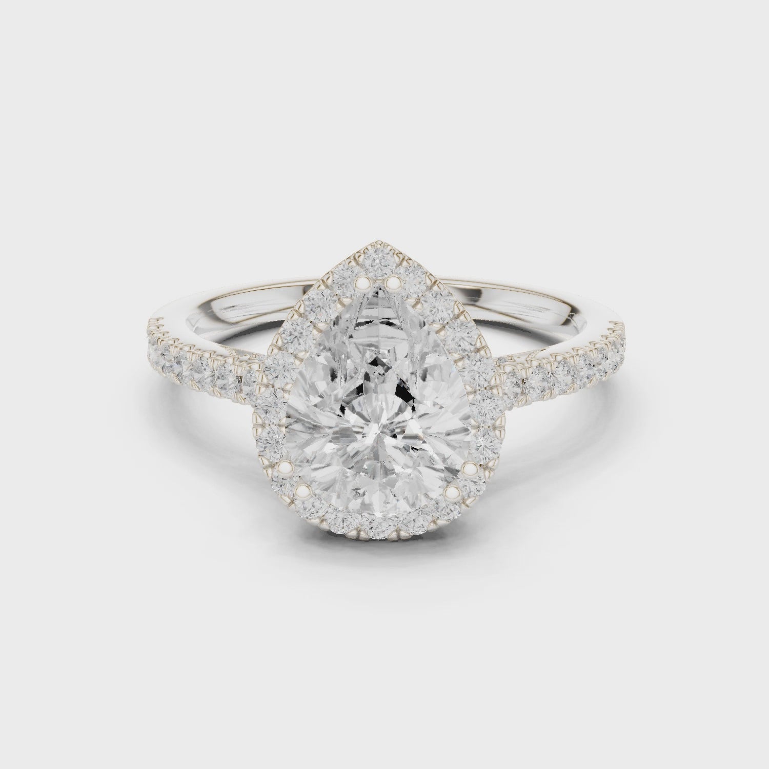 Pear Cut Halo Engagement Ring with Pavé Diamond Band