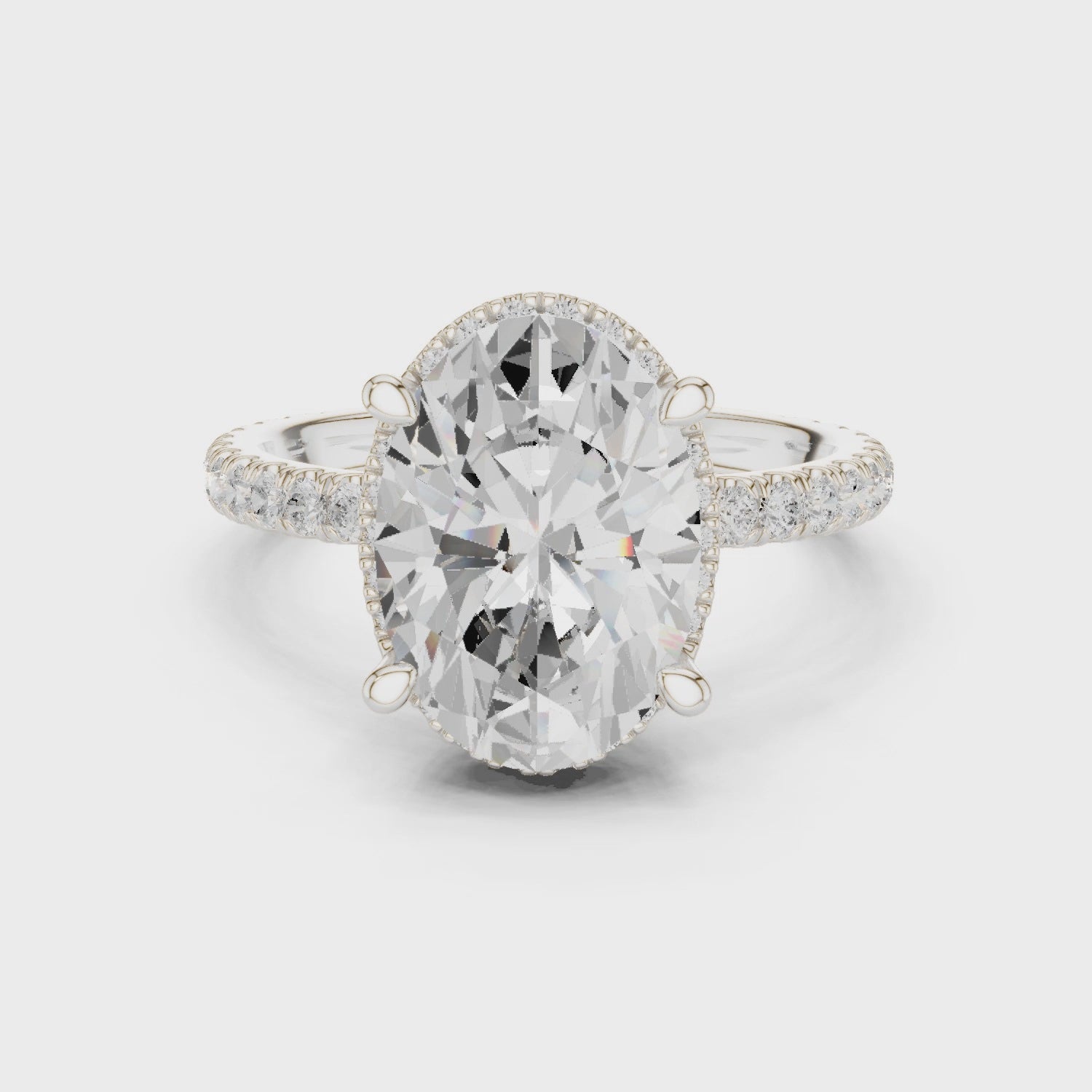 Oval Cut Engagement Ring with Hidden Halo
