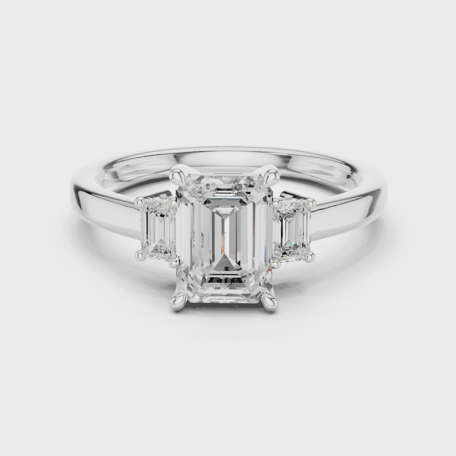 Emerald Engagement Trilogy Ring