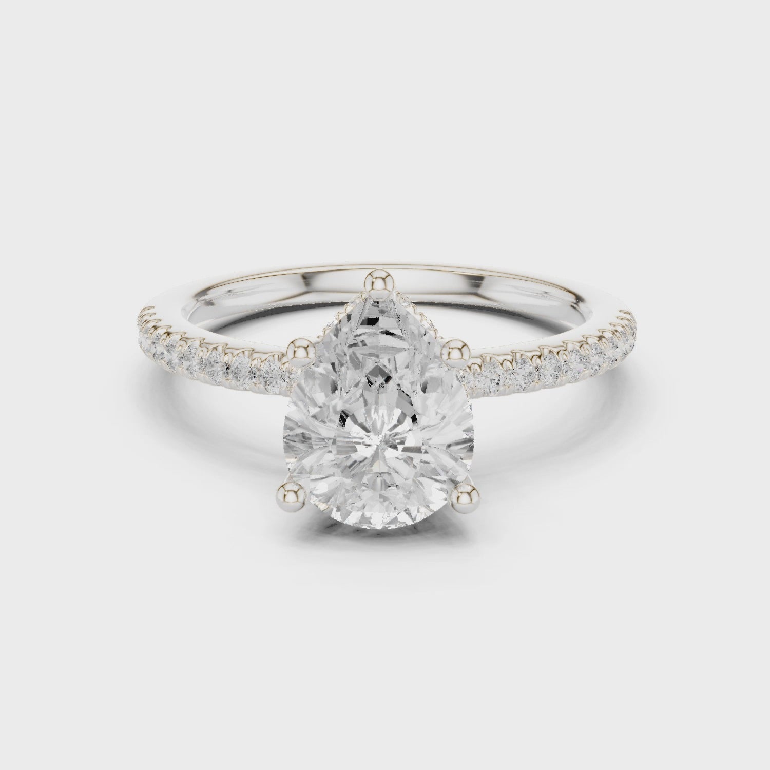 Pear Cut Hidden Halo Cathedral Pavé Engagement Ring