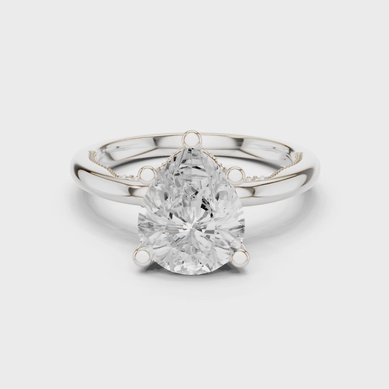 Pear Cut Engagement Ring with Twisted Split Shank and Hidden Halo