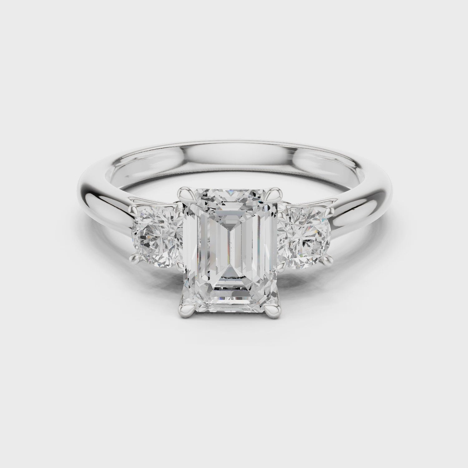 Emerald-Cut Three-Stone Engagement Ring