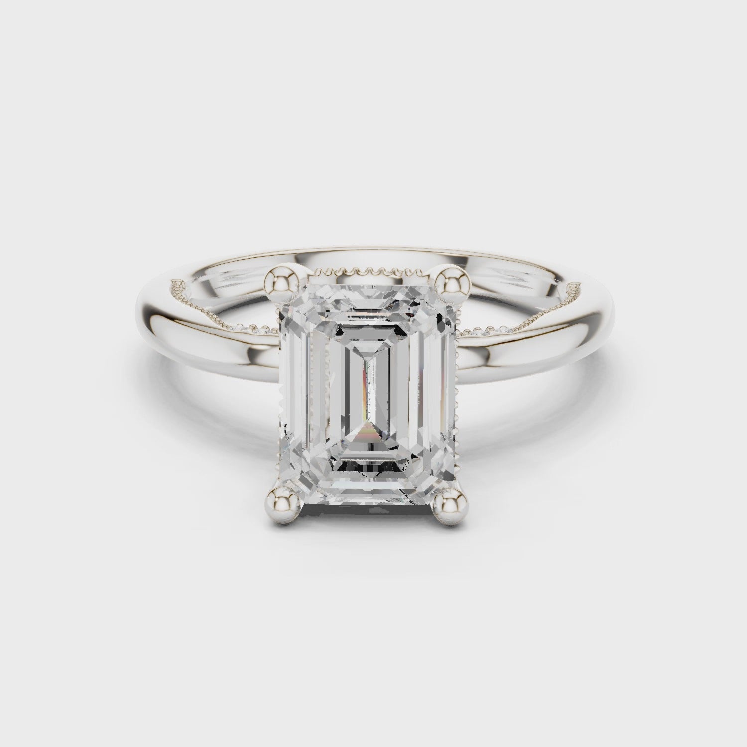 Emerald Cut Engagement Ring with Twisted Split Shank and Hidden Halo