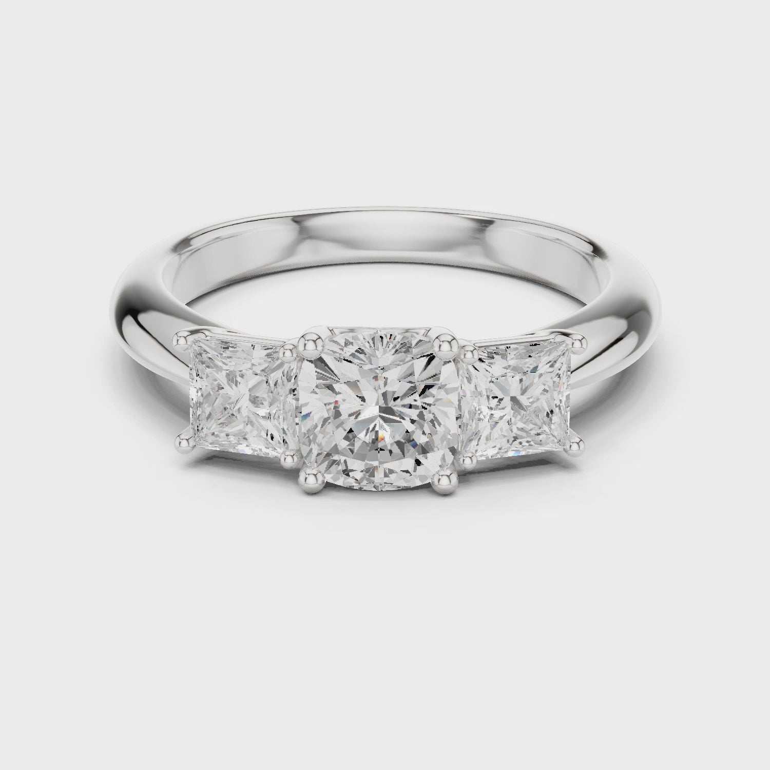 Cushion Cut Three-Stone Engagement Ring
