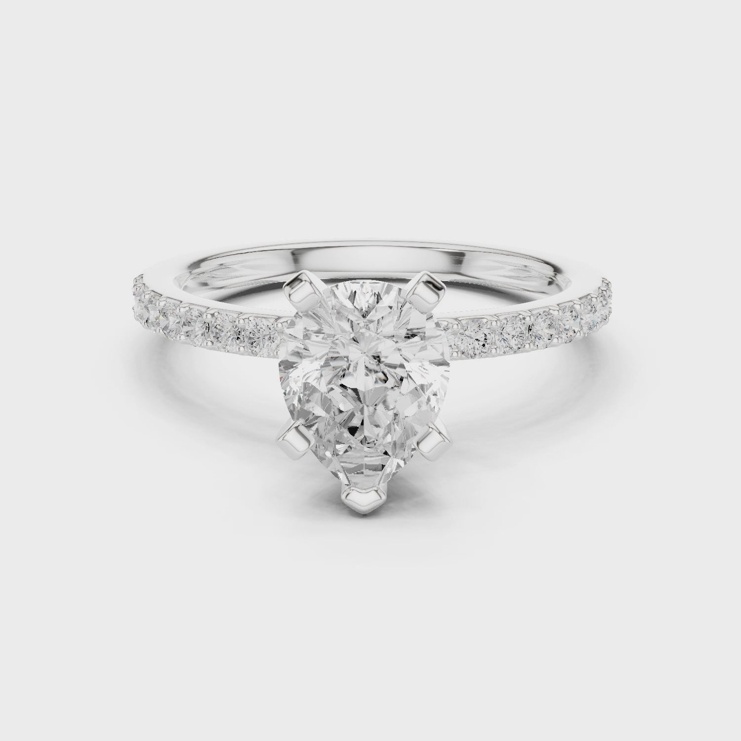 Graceful Pear-Cut Pavé Solitaire Ring
