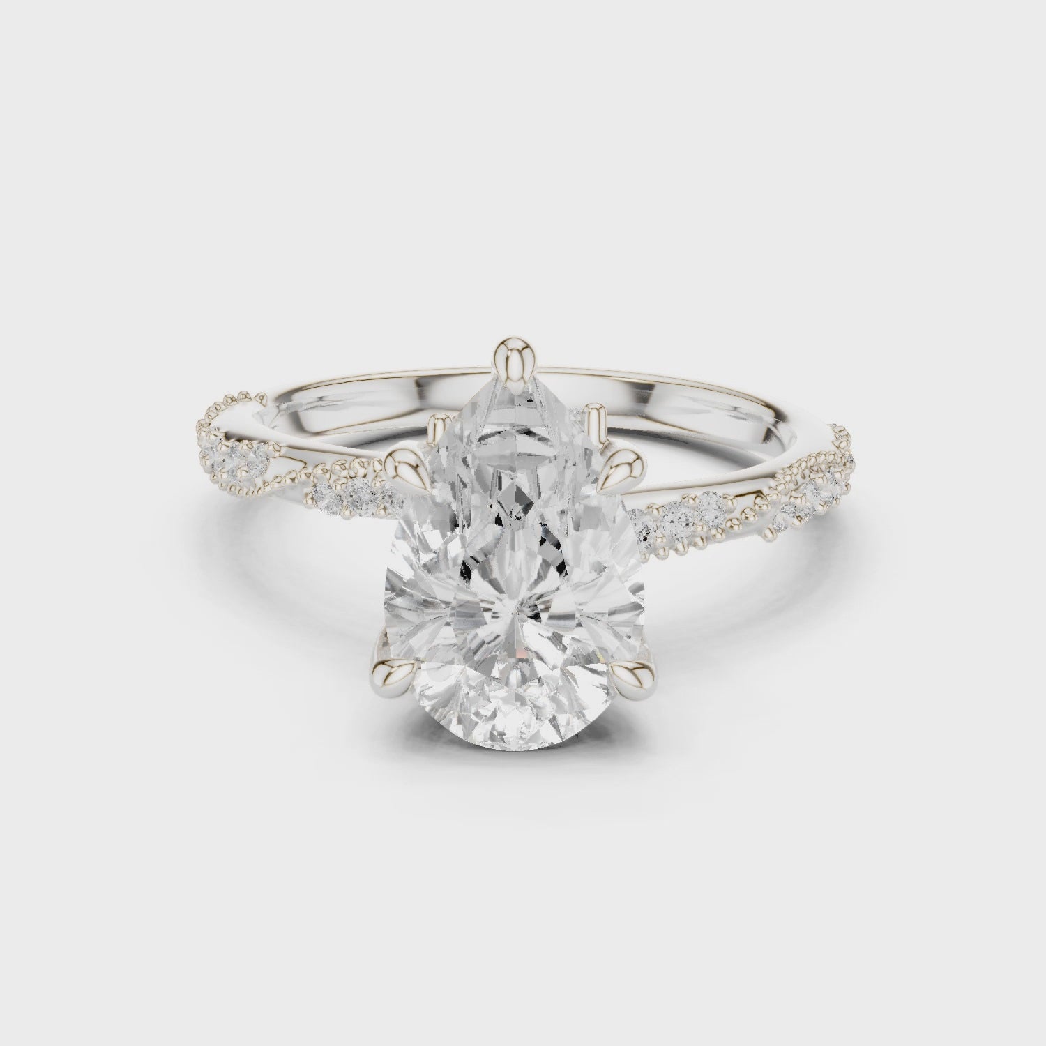 Pear Cut Solitaire Engagement Ring with Side Pavé Diamond Band and Hidden Halo
